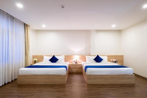 Postel nebo postele na pokoji v ubytování Sandals Star Hotel