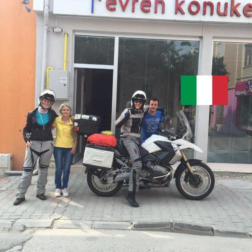 a group of people standing next to a motorcycle at Evren Konukevi Pansiyon in Bolu
