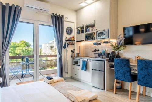 Η κουζίνα ή μικρή κουζίνα στο Central Kifissia BLέ Malomar Homing