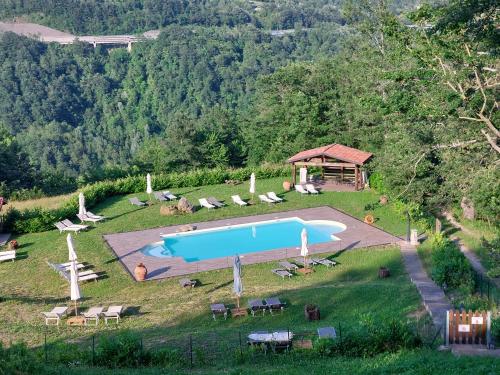 an aerial view of a swimming pool in a field at Agriturismo Ca' de' Magnani in Baragazza