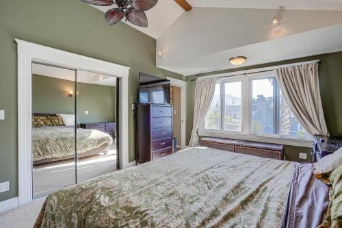 a bedroom with a bed and a large window at San Francisco Home with Hot Tub about 2 Mi to Downtown! in San Francisco
