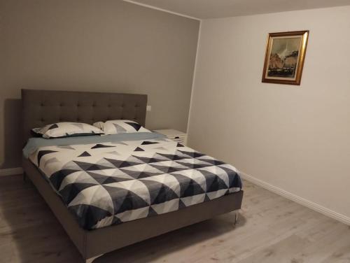 Ein Bett oder Betten in einem Zimmer der Unterkunft Casa Mont Blanc Cavnic