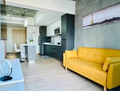 Kuchyň nebo kuchyňský kout v ubytování Cómodo y lujoso apartamento frente a Macroplaza