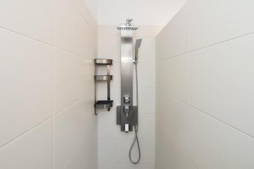 Ett badrum på Oeiras Yard - Checkinhome