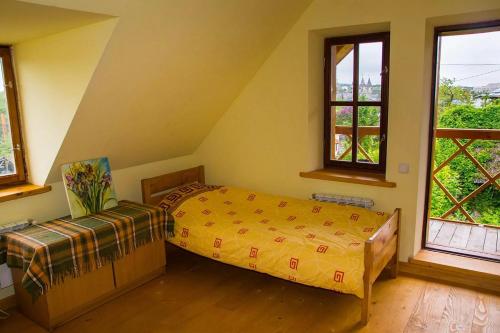 Postel nebo postele na pokoji v ubytování Tisnyi 7 Guest House