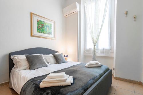 Posteľ alebo postele v izbe v ubytovaní Deluxe studio Milano