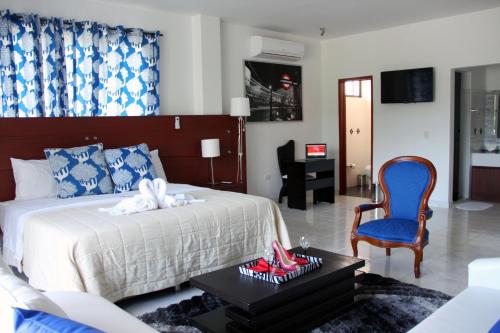 Hotel Reina Victoria tesisinde bir odada yatak veya yataklar