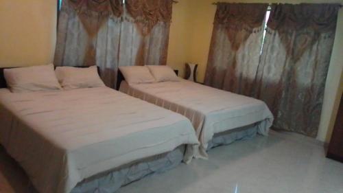 Postel nebo postele na pokoji v ubytování KumarVacation Martintar 70 Gray Unit 1