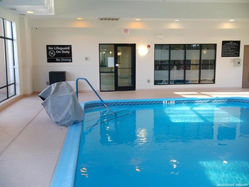 a swimming pool with a hose in a building at Wingate by Wyndham Buckhannon in Buckhannon