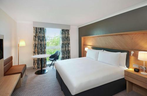 Ένα ή περισσότερα κρεβάτια σε δωμάτιο στο Hilton London Croydon