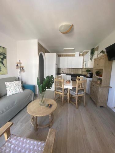 a living room with a couch and a table at Rotonda Apartaments in Felanitx