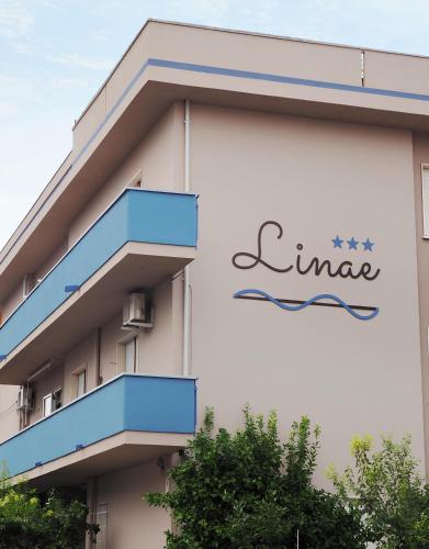 a sign on the side of a building at B&B Linae - Residence in Alba Adriatica
