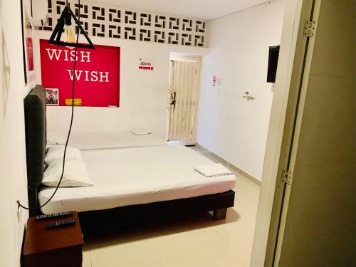 Postel nebo postele na pokoji v ubytování La Clave Hostel