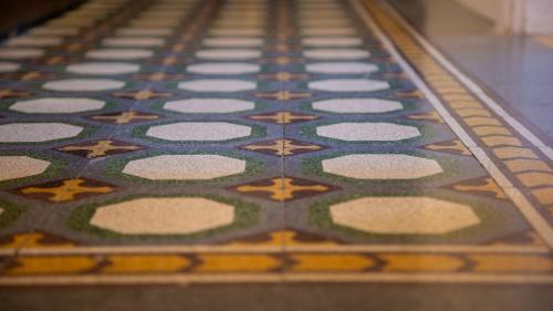 an ornate tile floor with a design on it at Good Morning Bologna in Bologna