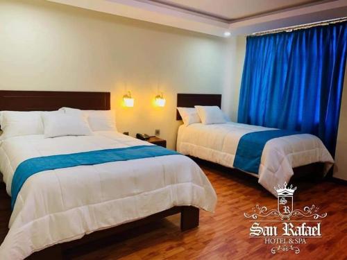 Ένα ή περισσότερα κρεβάτια σε δωμάτιο στο San Rafael Hotel