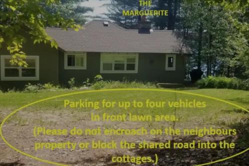 a house with a sign that reads parking for up to four vehicles at The Lakehouse in Carnarvon