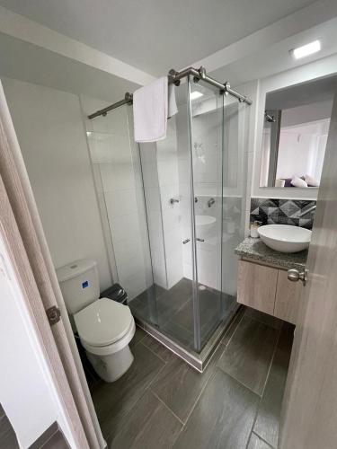 a bathroom with a shower and a toilet and a sink at APTO EN NORTE DE ARMENIA in Armenia