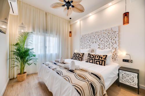 En eller flere senger på et rom på XPCE INDONESIAN DREAMS - Luxury in Old Town
