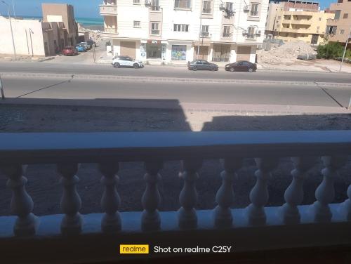 a view of a street from a balcony at الفيروز in Hurghada