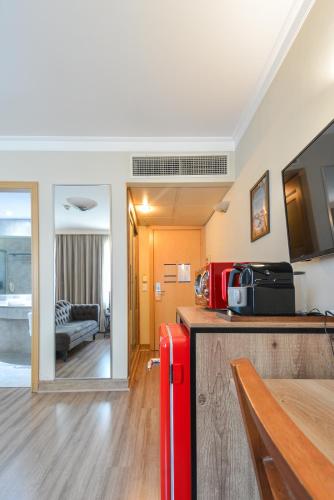 Кухня или мини-кухня в Premium room Berrini
