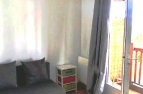 Ein Sitzbereich in der Unterkunft Appartement Charme petite terrasse à 400m de Paris