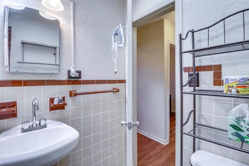 a bathroom with a sink and a mirror at Cozy Easton Condo Near Historic Downtown in Easton