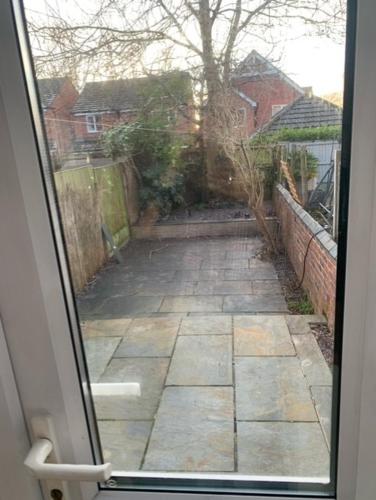 a view of a walkway from a window of a house at Holiday Home in Kidderminster in Kidderminster