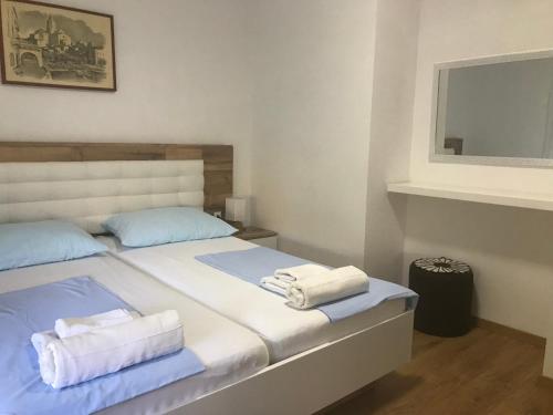 Postel nebo postele na pokoji v ubytování City Retro Chic Apartment Magdalena Trogir