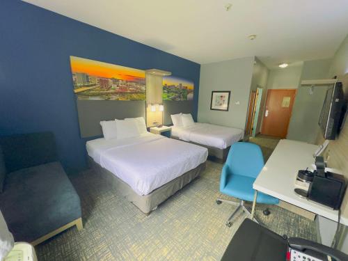 Ένα ή περισσότερα κρεβάτια σε δωμάτιο στο Best Western Plus Glen Allen Inn