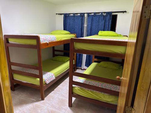 Postel nebo postele na pokoji v ubytování Cabaña #5 en Condominio Mar de Coveñas