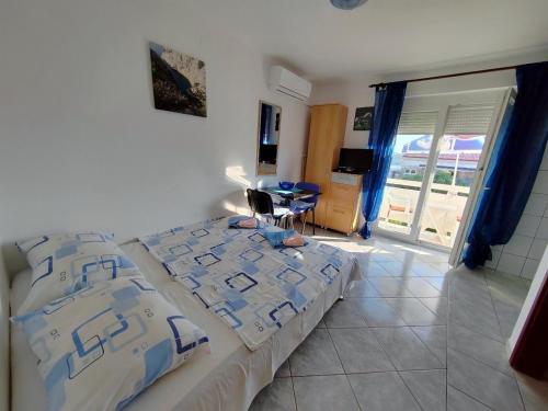 Apartments with parking space Barbat, Rab - 22217