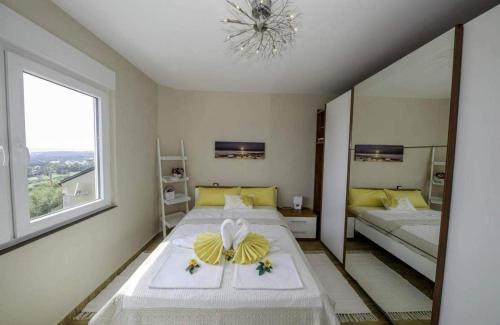 Apartments with parking space Banjol, Rab - 22226