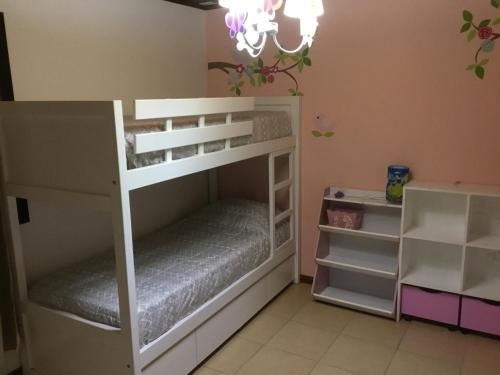 a bunk bed room with two bunk beds at V&V House in Concordia