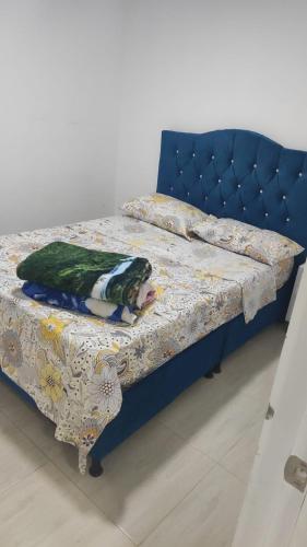 Tempat tidur dalam kamar di Apartamento turístico portal del prado