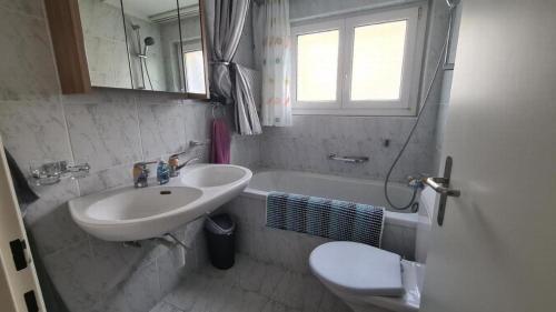 a bathroom with a sink and a toilet at Chalet Lavendel - b48868 in Lax