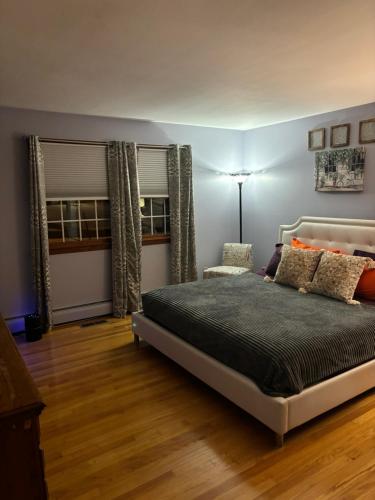 Кровать или кровати в номере Jays Ranch Hamden