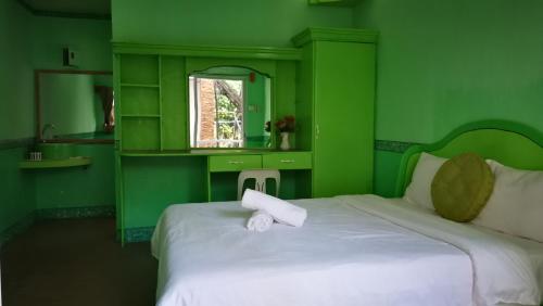 Voodi või voodid majutusasutuse CHIBEL SUMMER RIVERSIDE HOTEL toas