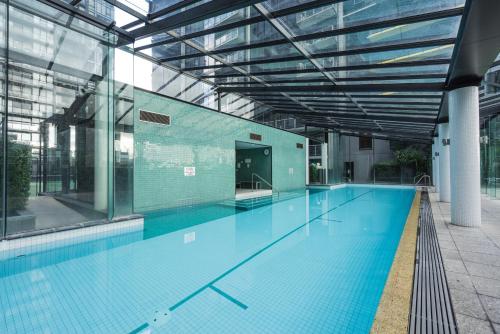 a large swimming pool in a building at IMSA Group in Melbourne
