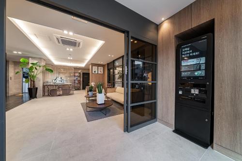 a lobby of a building with a waiting room at Browndot Suwon cityhall in Suwon