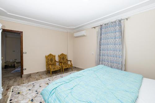 Postel nebo postele na pokoji v ubytování Chez l'ami hotel