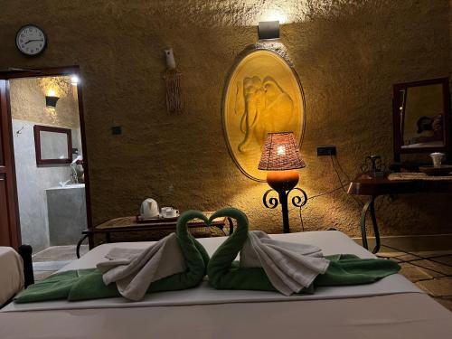 Postel nebo postele na pokoji v ubytování Akein Jungle Resort - Sigiriya