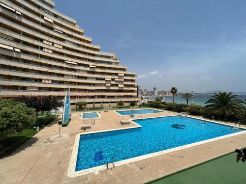 Calpe apartamento 1a linea de playa piscina reformado wifi aire