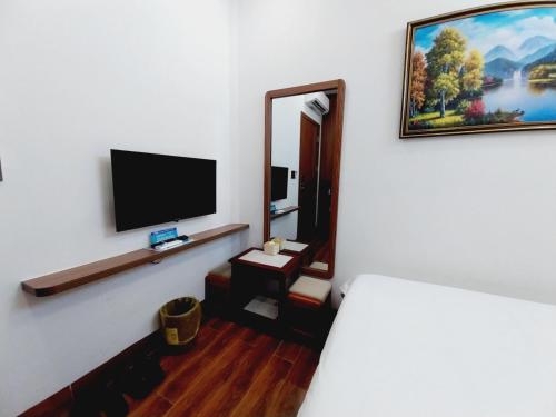 Santini Hotelにあるテレビまたはエンターテインメントセンター