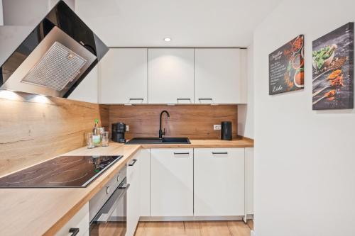 Kuchyň nebo kuchyňský kout v ubytování "Harmonie Hütte" warmherzig eingerichtetes und ruhig gelegenes Appartement!