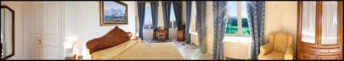 a living room with a couch in a room at Villa Angelina in Massa Lubrense