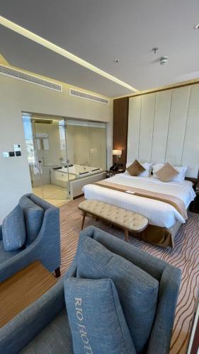 Katil atau katil-katil dalam bilik di Rio Hotel Olaya