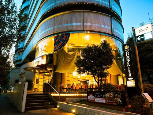 a building with a staircase in front of it at APA Hotel Osaka Temma in Osaka