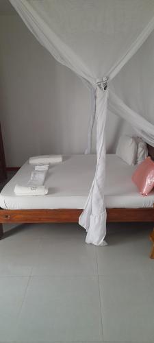 Postel nebo postele na pokoji v ubytování Aqua Resort