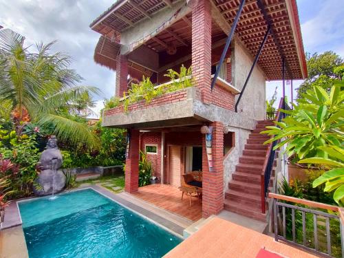 Πισίνα στο ή κοντά στο D'Nanda mini hotel Ubud
