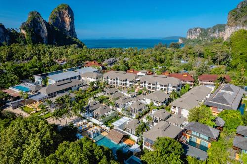 an aerial view of a resort with mountains at Bhu Nga Thani Resort & Villas Railay in Railay Beach